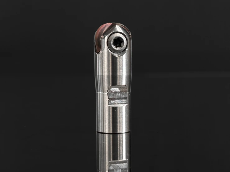 Uniworx® ball nose and torus end mill from Pokolm against a black background.