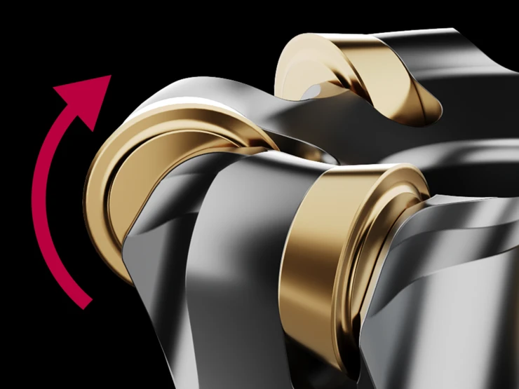 Spinworx® with self-rotating round inserts, illustrated with a red arrow pointing clockwise.