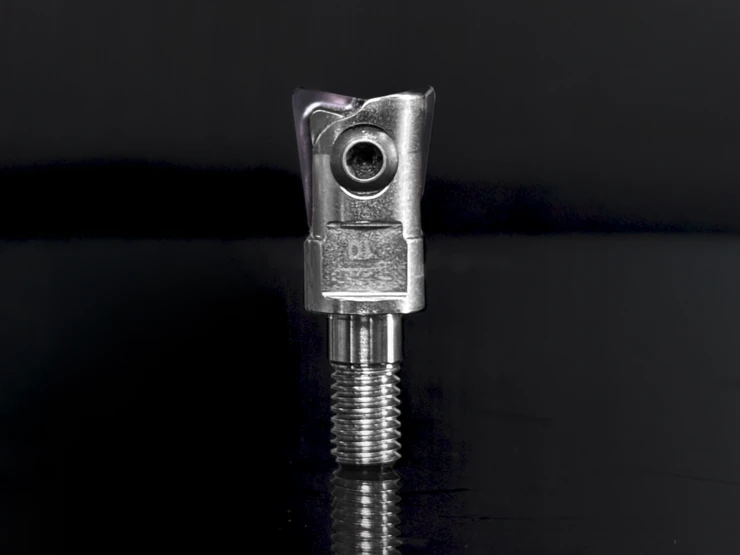 Uniworx® PLUS corner radius and high-feed milling cutter from Pokolm against a black background.